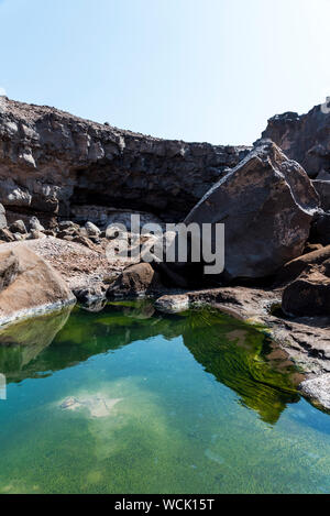 Hot spring sea water and small swamps near Lac Assal (Salt Lake) , 150m below sea level -  Djibouti, East Africa Stock Photo