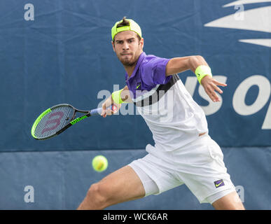 New York, United States. 27th Aug, 2019. Karen Khachanov (Russia) in action during round 1 of US Open Tennis Championship against Vasek Pospisil (Canada) at Billie Jean King National Tennis Center (Photo by Lev Radin/Pacific Press) Credit: Pacific Press Agency/Alamy Live News Stock Photo