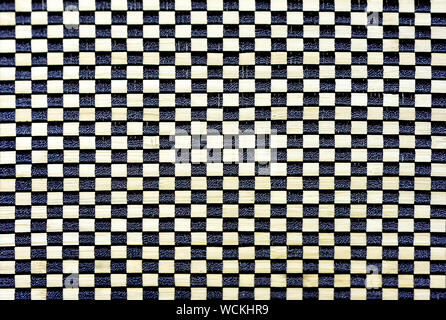 Rug with checkered pattern of fabric. Background for design and decoration. Stock Photo