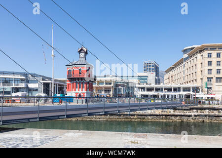 Marina Swing Bridge connecting the Alfred and Victoria Basins at the Clock Tower, V&A Waterfront in Cape Town, South Africa opening for boat traffic Stock Photo