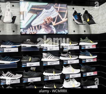 frost wherever tired Adidas trainers/training shoes store display in Sports Direct store. UK  Stock Photo - Alamy