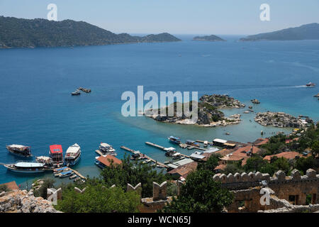 Simena is actually the ancient Lycian name for it. In Turkish, it is known as Kalekoy which translates into “Castle Village”. Stock Photo