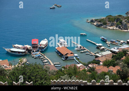 Simena is actually the ancient Lycian name for it. In Turkish, it is known as Kalekoy which translates into “Castle Village”. Stock Photo