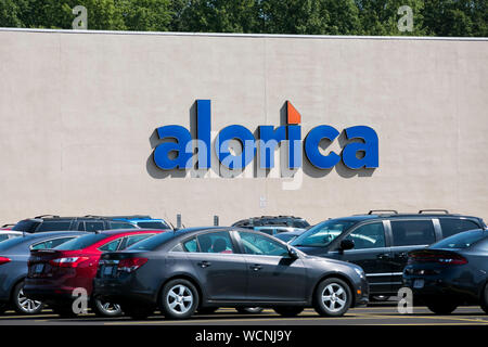 A logo sign outside of a Alorica call center location in Niles, Ohio on August 12, 2019. Stock Photo