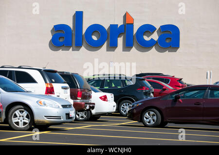 A logo sign outside of a Alorica call center location in Niles, Ohio on August 12, 2019. Stock Photo