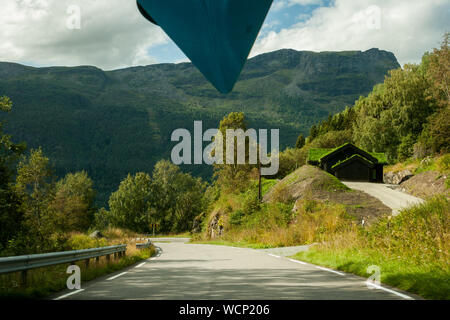 Driving through Jotunheimen National Park, Norway Scandinavia with Kajaks on the roof Stock Photo