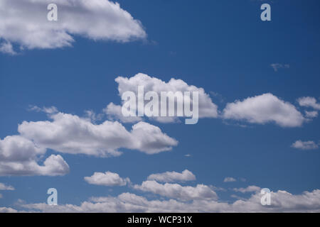 Puffy white clouds Stock Photo