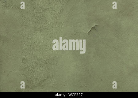 Green Light Textured Rendered Wall - Stucco / Fresco effect with small ripples and chips Stock Photo