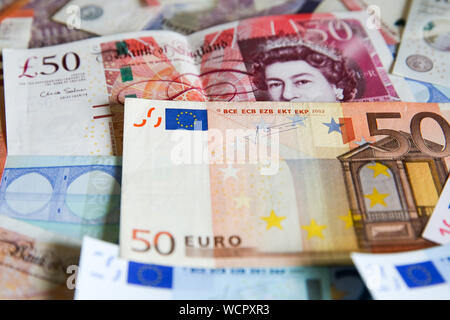 London, UK. 28th Aug, 2019. Pounds notes and Euros are seen together as the value of the pound falls after the Queen consents to suspension of the UK parliament for five weeks. The Â£ is now worth Ã›1.10. Credit: Steve Taylor/SOPA Images/ZUMA Wire/Alamy Live News Stock Photo