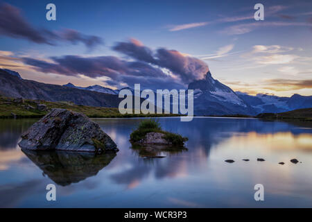 Matterhorn reflected in the Stellisee at sunset, Zermatt, Valais, Switzerland Stock Photo