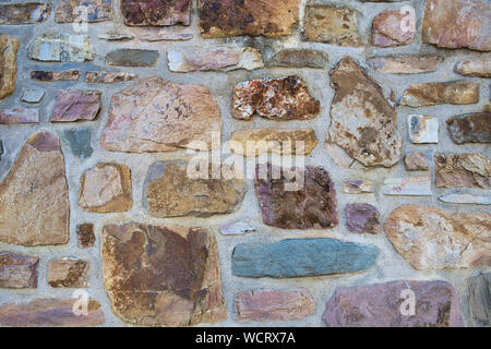 close up of stones in an old town wall as background Stock Photo