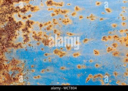 Texture of peeling paint from rusty metal. Abstract background for design. Stock Photo