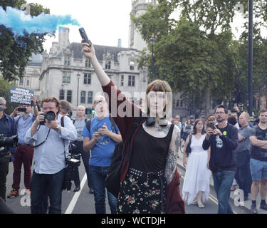 Westminster, London, UK. 28th Aug, 2019. Westminster, London, 28th August 2019.Thousands of outraged protesters gather in College Green, Parliament Square and later outside Downing Street in Westminster for a 'Stop the Coup' protest against the planned prorogation of Parliament in September, which was today ordered by the government, and approved by the Queen at Balmoral. Credit: Imageplotter/Alamy Live News Stock Photo