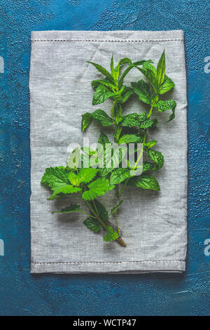 Herbs and spices.Fresh herbs selection included rosemary, thyme, mint, lemon balm and arugula. Overhead view, copy space. Stock Photo