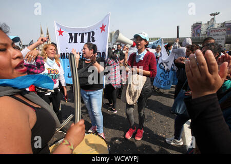 August 28, 2019, Buenos Aires, Buenos Aires, Argentina: Social organizations protest against economic crisis and the IMF agreement. Protesters cut the traffic on the 25 de Mayo - AU 1 highway for more than 4 hours. (Credit Image: © Claudio Santisteban/ZUMA Wire) Stock Photo