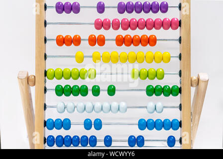 Children's wooden abacus on an white background. Stock Photo