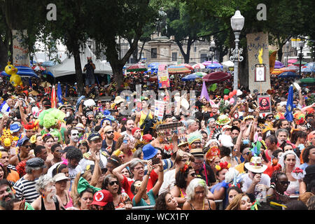 RIO DE JANEIRO, BRAZIL, MARCH, 03, 2019: Revelers have a great time dressed up in the Cordão do Boi Tata block in downtown Rio de Janeiro Stock Photo