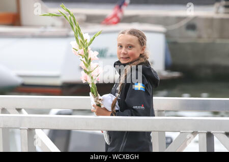 New York, United States. 28th Aug, 2019. Swedish climate activist Greta Thunberg, 16, arrives in the US after a 15-day journey crossing the Atlantic in the Malizia II, a zero-carbon yacht, on August 28, 2019 in New York. - 'Land! The lights of Long Island and New York City ahead,' she tweeted early Wednesday. She later wrote on Twitter that her yacht had anchored off the entertainment district of Coney Island in Brooklyn to clear customs and immigration. Credit: Brazil Photo Press/Alamy Live News Stock Photo