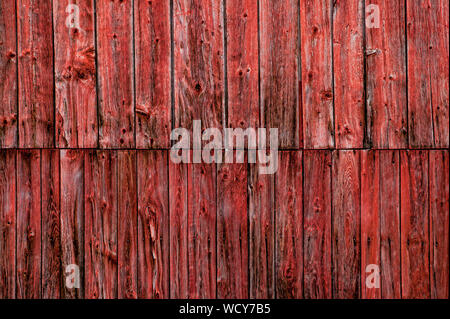 Closeup of the side of a weathered red barn, Stowe, Vermont, USA Stock Photo