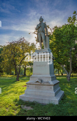 View of the Alexander Hamilton Monument in Central Park in New York City. He was an American statesman and one of the Founding Fathers. Stock Photo