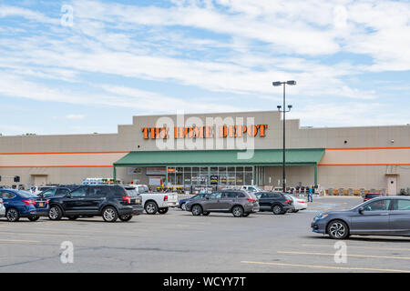 A Home Depot store in Amsterdam, NY - an outlet for the largest home improvement retailer in the US, with vehicles and customers in the parking lot Stock Photo