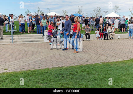 Crowds fill Voinovich Park on the Northcoast Harbor of Cleveland, Ohio during the first annual Picklefest in 2019. Stock Photo