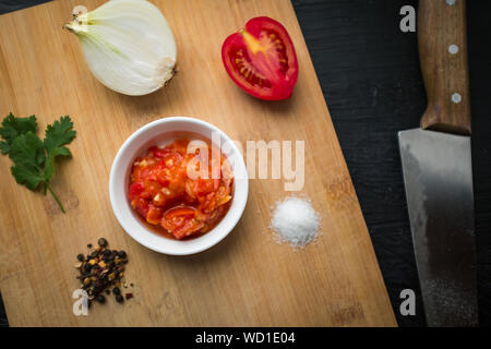 Ingredients and Preparation of Typical Sauce Colombian: Hogao Stock Photo