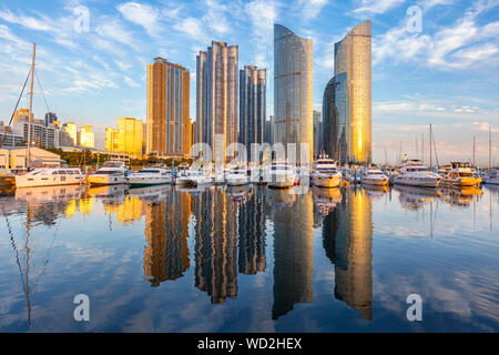 Busan, South Korea city skyline in the Haeundae district at sunset. Stock Photo