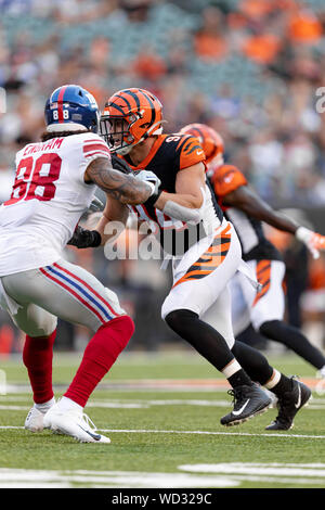 Cincinnati Bengals defensive end Sam Hubbard (94) celebrates with DJ Reader  (98) after making a sack during an NFL football game against the Kansas  City Chiefs, Sunday, Dec. 4, 2022, in Cincinnati. (