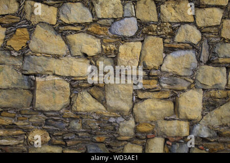 Texture for a natural background of golden and gray rocks, beautiful to decorate that photo or presentation Stock Photo