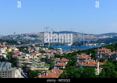 The Bosphorus bridge connects  Ortaköy in the European side of Istanbul with Beylebeyi on the Asian side of the city. Stock Photo