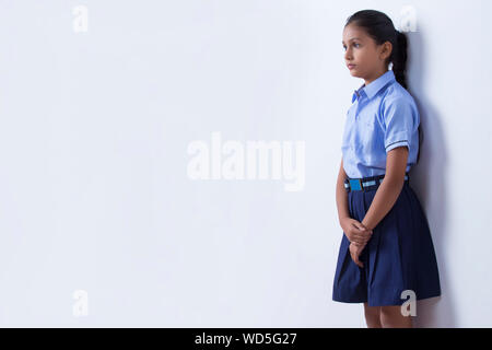 portrait of a school girl standing Stock Photo