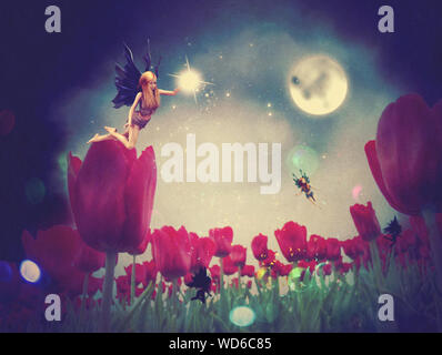 Dream fairy in fantasy land with bright red tulips at night time. Stock Photo