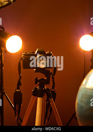 World reflection through a camera lens in a photography studio. Stock Photo
