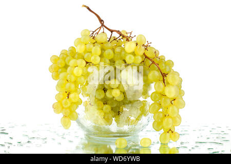 Bunch of white grapes in a glass vase on a white background isolated close up Stock Photo