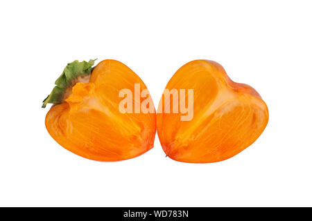 Persimmon orange fruit with green leaves sliced in two halves on white background isolated close up Stock Photo