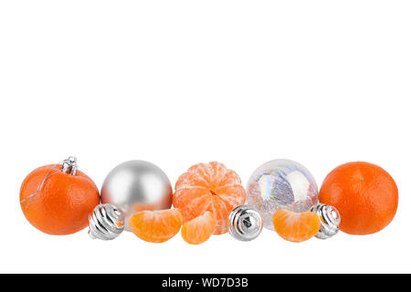 New Year border, Christmas pattern, Christmas tree decorations, silver glass balls, tangerines, mandarines on white background isolated close up Stock Photo