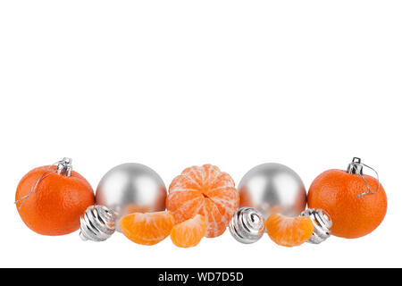 New Year border, Christmas pattern, Christmas tree decorations, silver glass balls, tangerines, mandarines on white background isolated close up Stock Photo