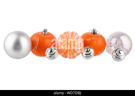 New Year border, Christmas pattern, Christmas tree decorations, silver glass balls, tangerines, mandarines on white background isolated close up Stock Photo