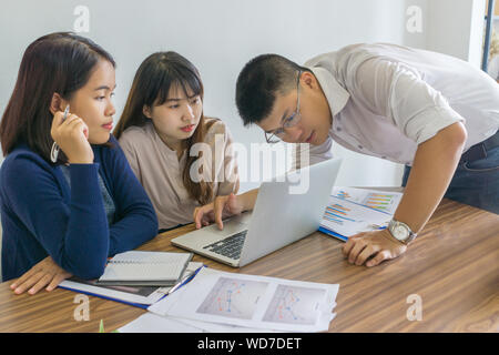 Group of people discussing and having teamwork on business project Stock Photo