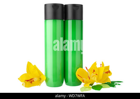 Two green plastic shampoo, hair conditioner bottles or shower gel, moisturizing lotion template on white background isolated close up, yellow flowers Stock Photo