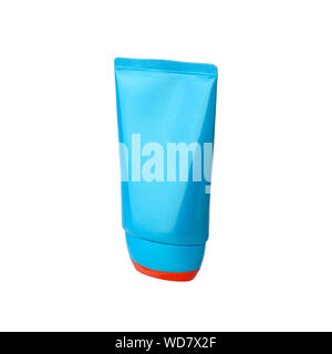 Blue sunscreen cream bottle with red cap on white background isolated close up, face or body sun screen or skin care balm plastic tube mock up, spf Stock Photo