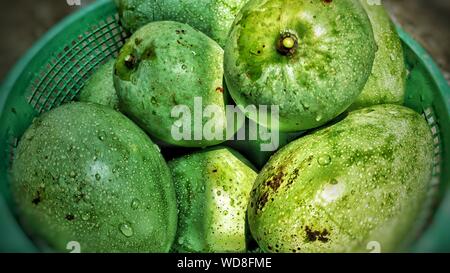 Close-up Of Green Mangoes In Basket