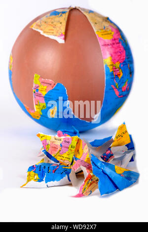 Broken World Globe torn into pieces Stock Photo