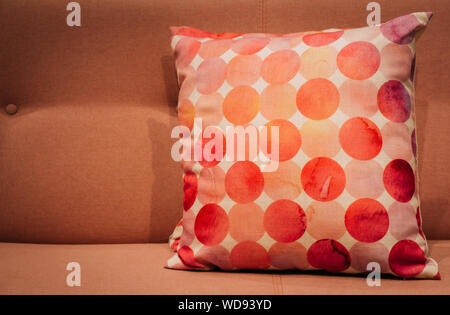 red dot color Pillows on sofa in room Stock Photo