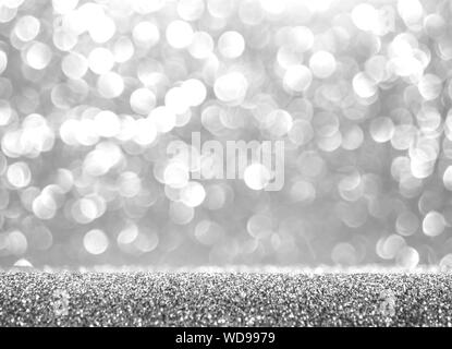 Abstract glitter silver background. Holiday shiny texture. Winter xmas theme Stock Photo