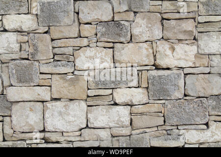 Dry stone wall as seamless background Stock Photo