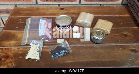 Conetnts of one of the three individual meal cartons found inside an Australian WWII O2 Operation Ration Stock Photo