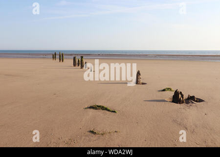 Sunny day at Titchwell Marsh and beach reserve with blue skies, North Norfolk coast, on beahc. Stock Photo