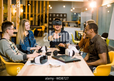 Business People Group testing Vr Headset During Brainstorming, Team In 3d Glasses On Meeting Virtual Reality Technology Concept. Stock Photo